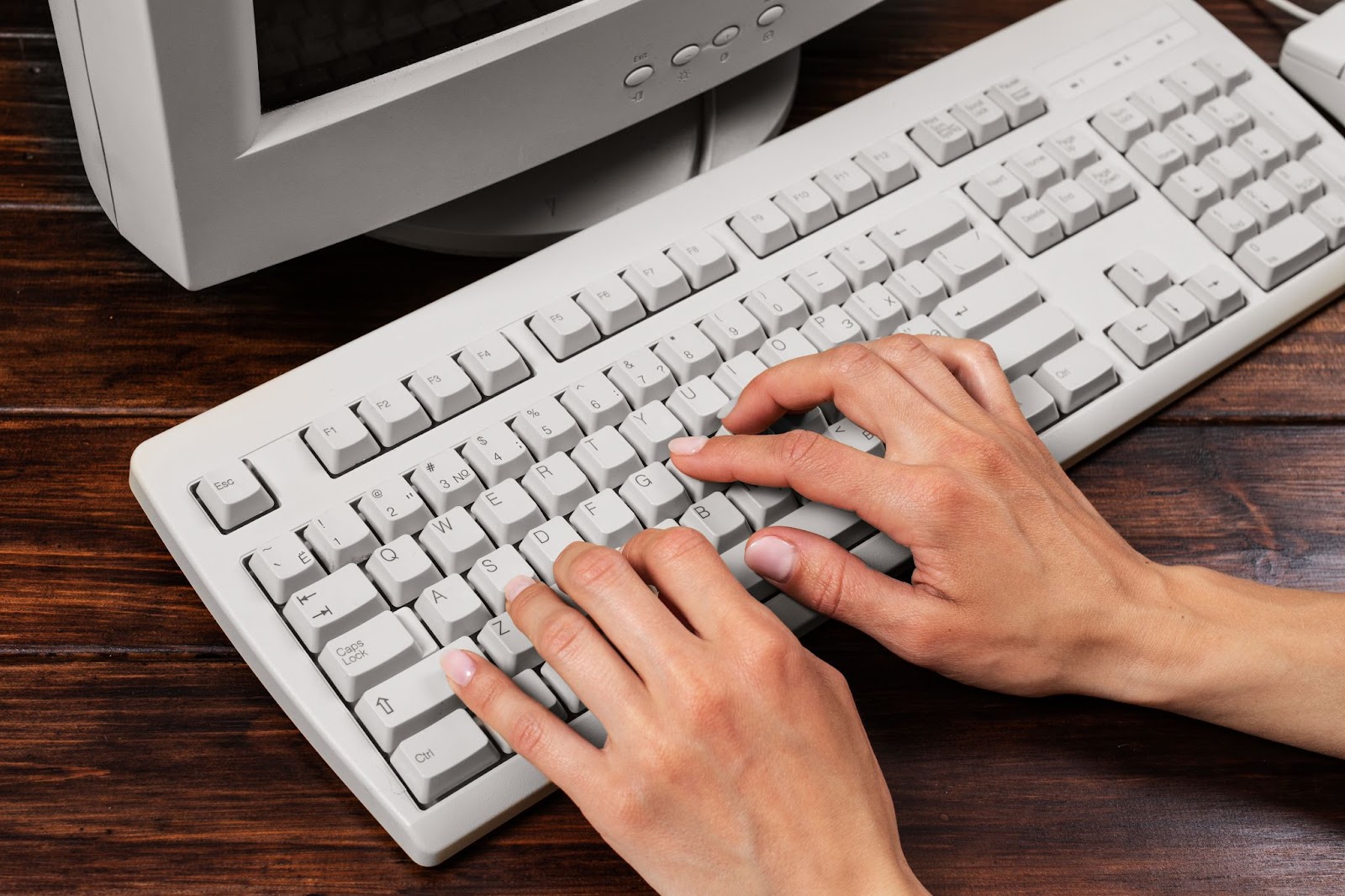 Top view of person using computer